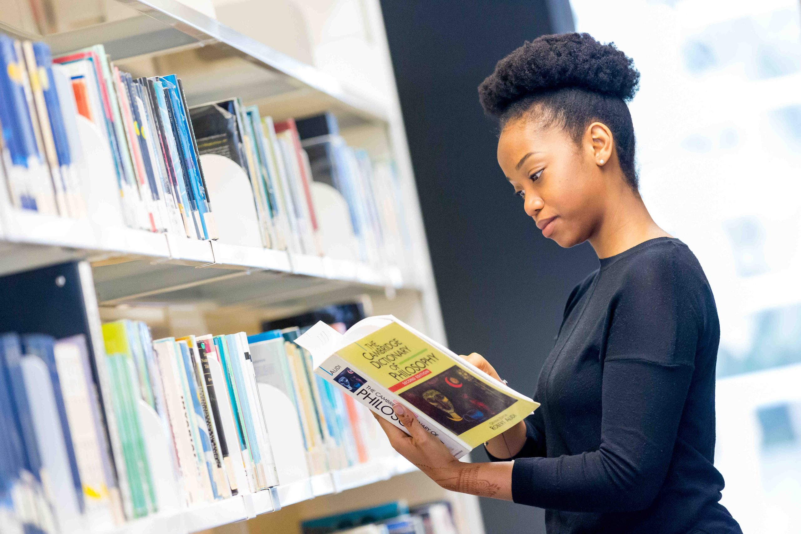 Girl reading in library